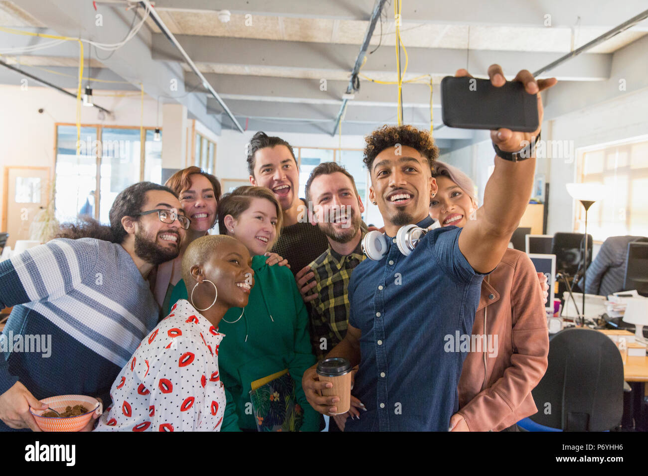 Creative business team taking selfie in office Stock Photo