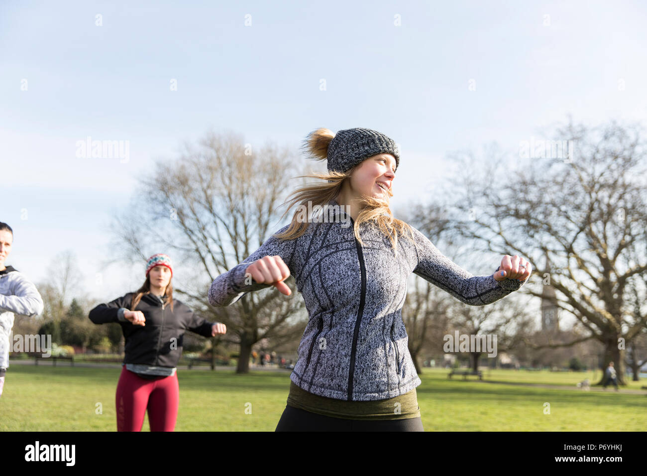 Woman dancing on sunny park hi-res stock photography and images - Alamy
