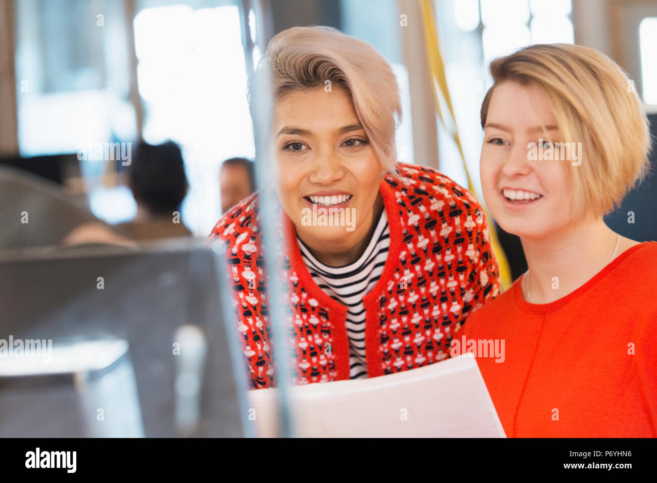 Creative businesswomen working at computer in office Stock Photo