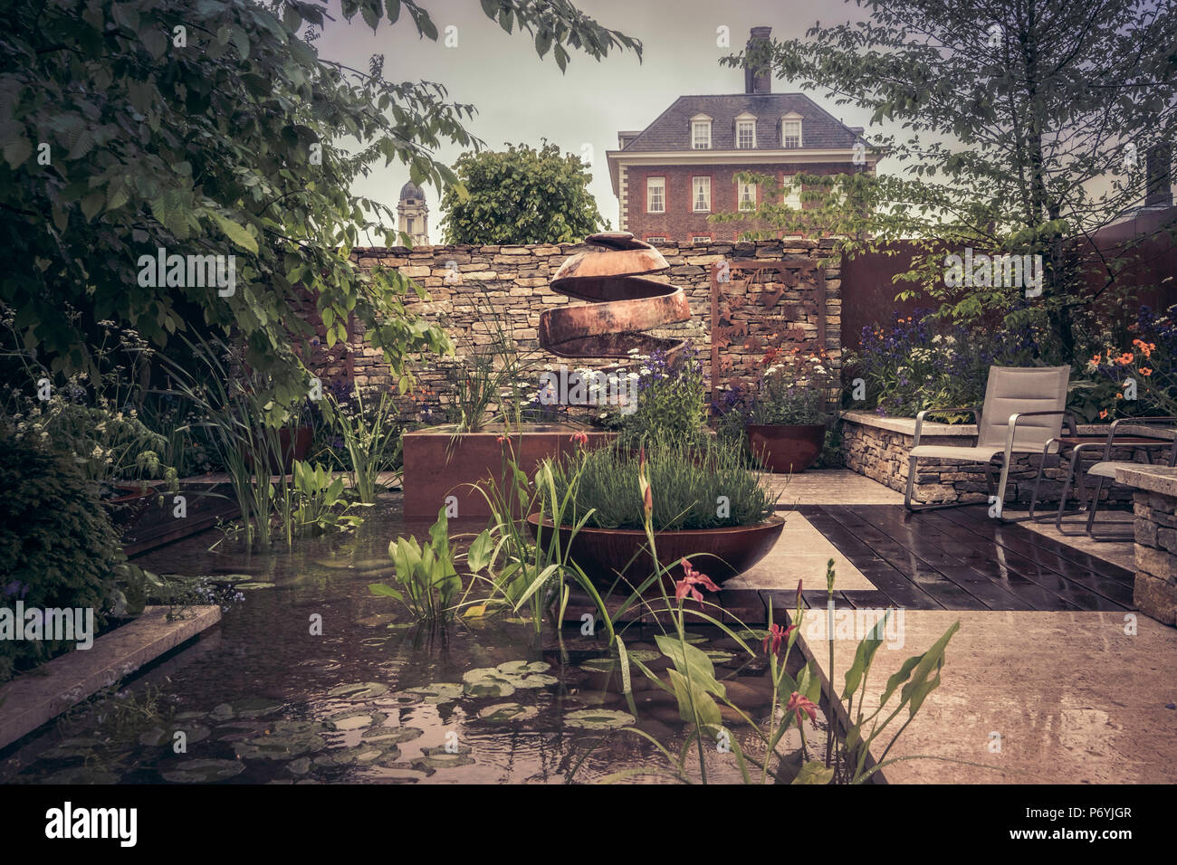 The Skin Deep Garden designed by Robert Barker at the Chelsea Flower Show, London, UK. Stock Photo