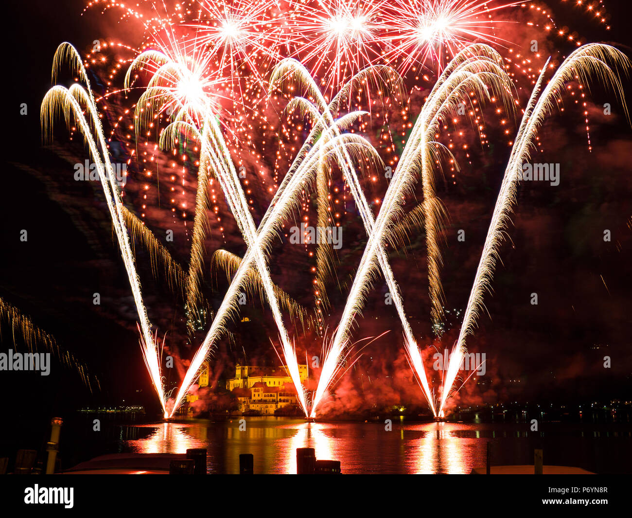 colorful fireworks display on the Orta Lake island. Piedmont,Italy Stock Photo