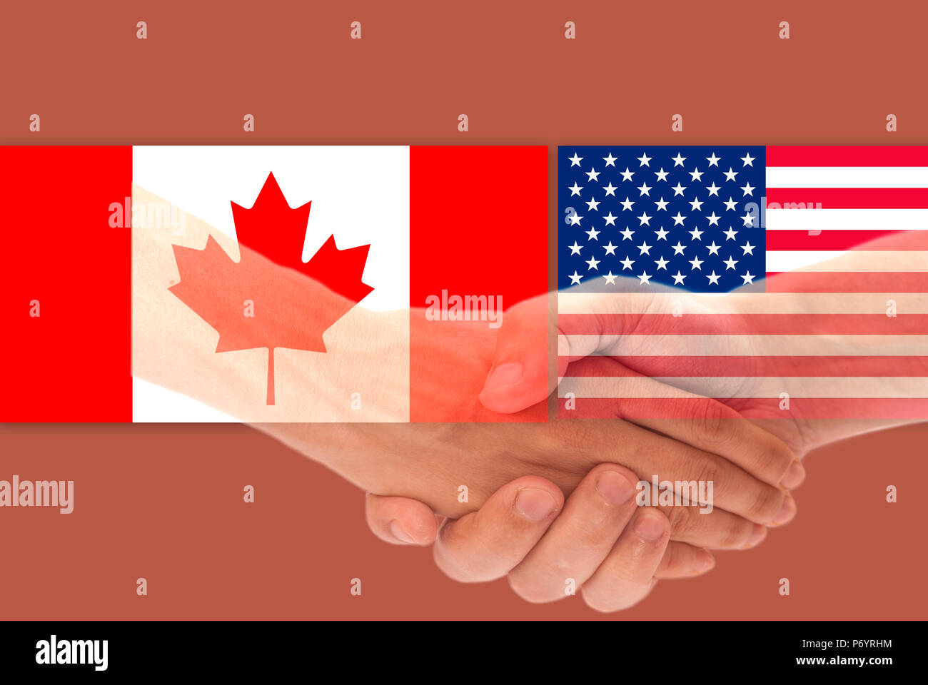 USA and Canada flag with handshake close up . Stock Photo