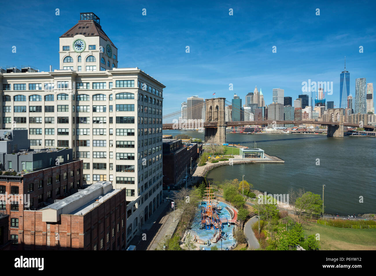 USA, New York, Brooklyn, DUMBO, Clock Tower Condominium, Brooklyn Bridge Stock Photo