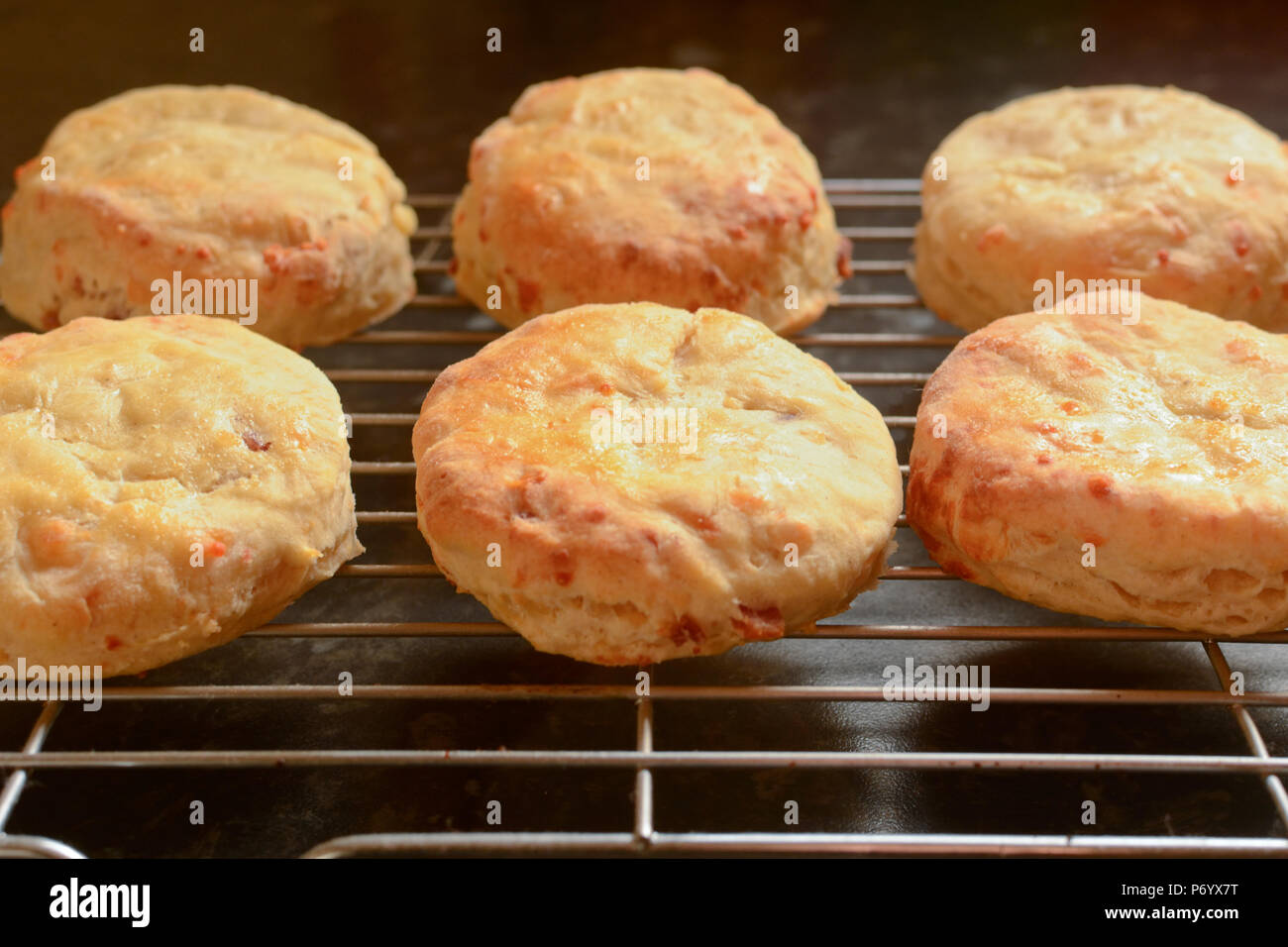 Cheese scones cooling on wire rack Stock Photo Alamy