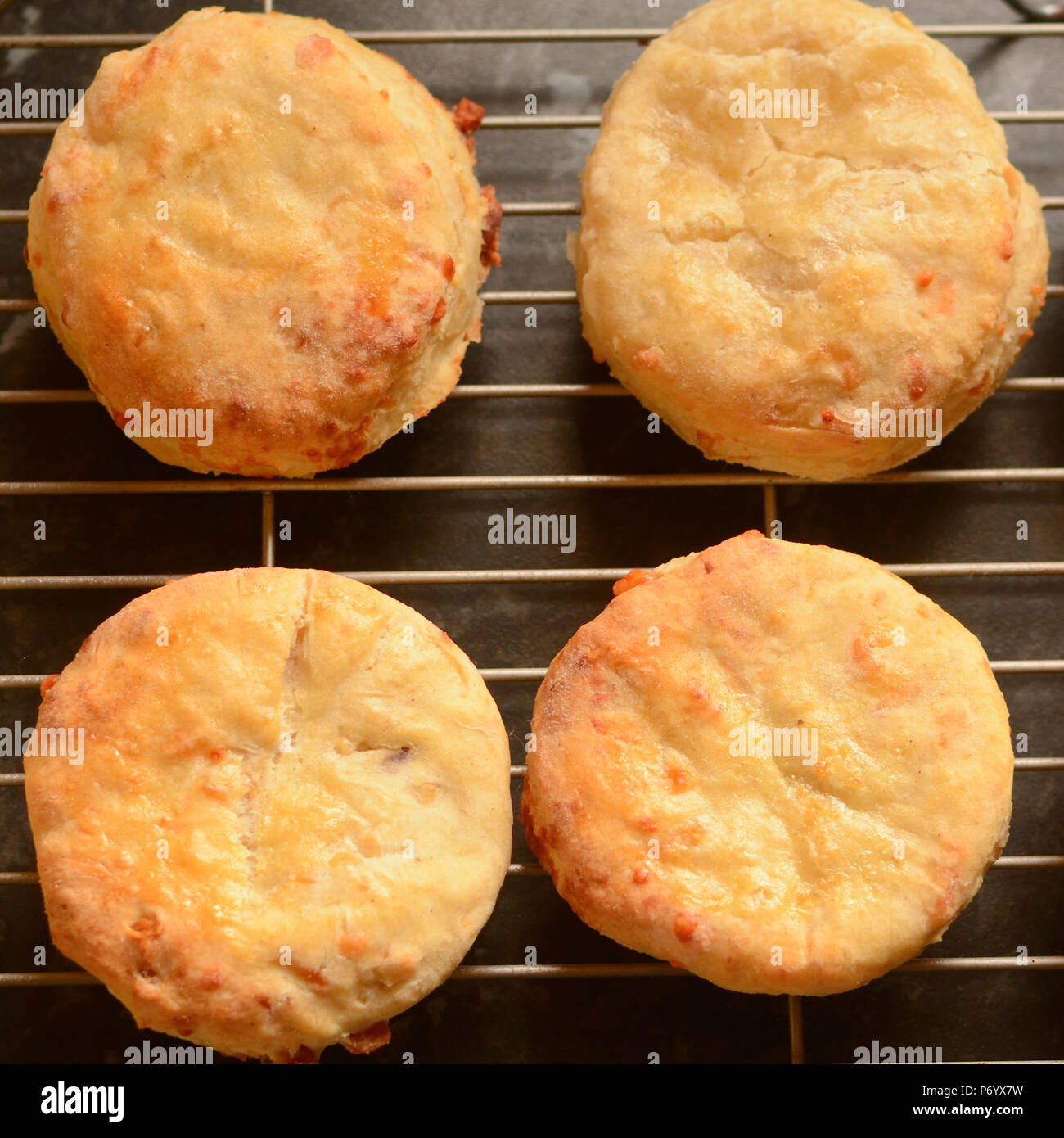Cheese scones cooling on wire rack Stock Photo Alamy