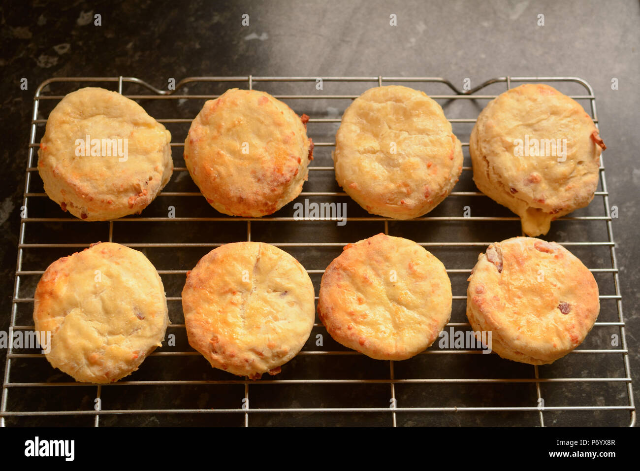 Cheese scones cooling on wire rack Stock Photo Alamy