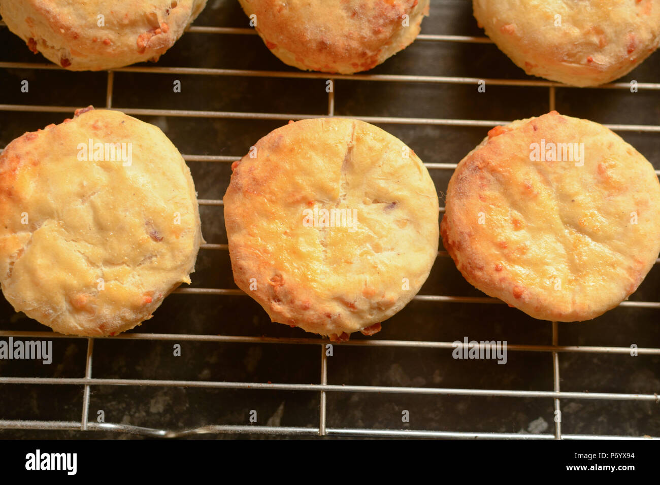 Cheese scones cooling on wire rack Stock Photo Alamy