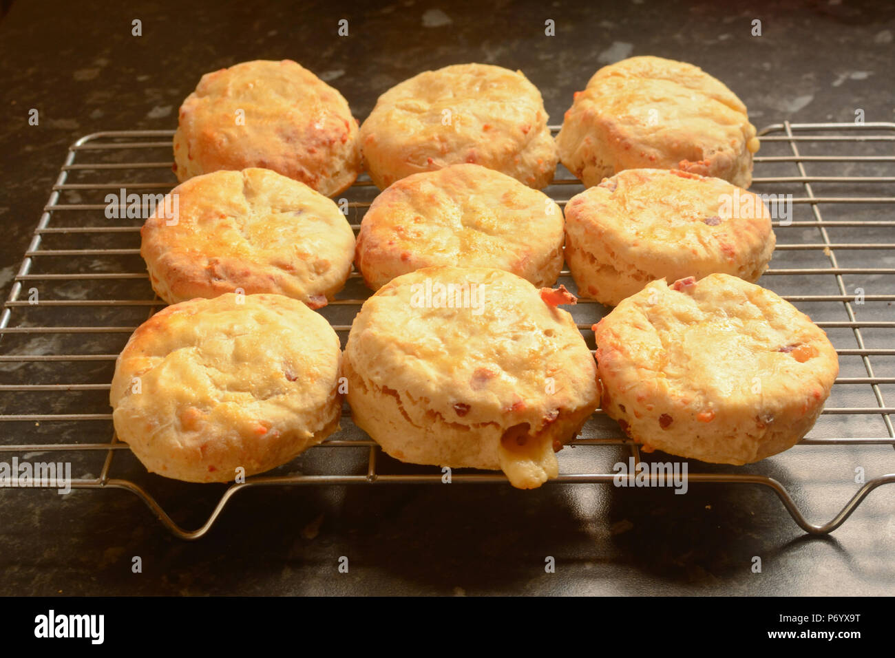 Cheese scones cooling on wire rack Stock Photo Alamy