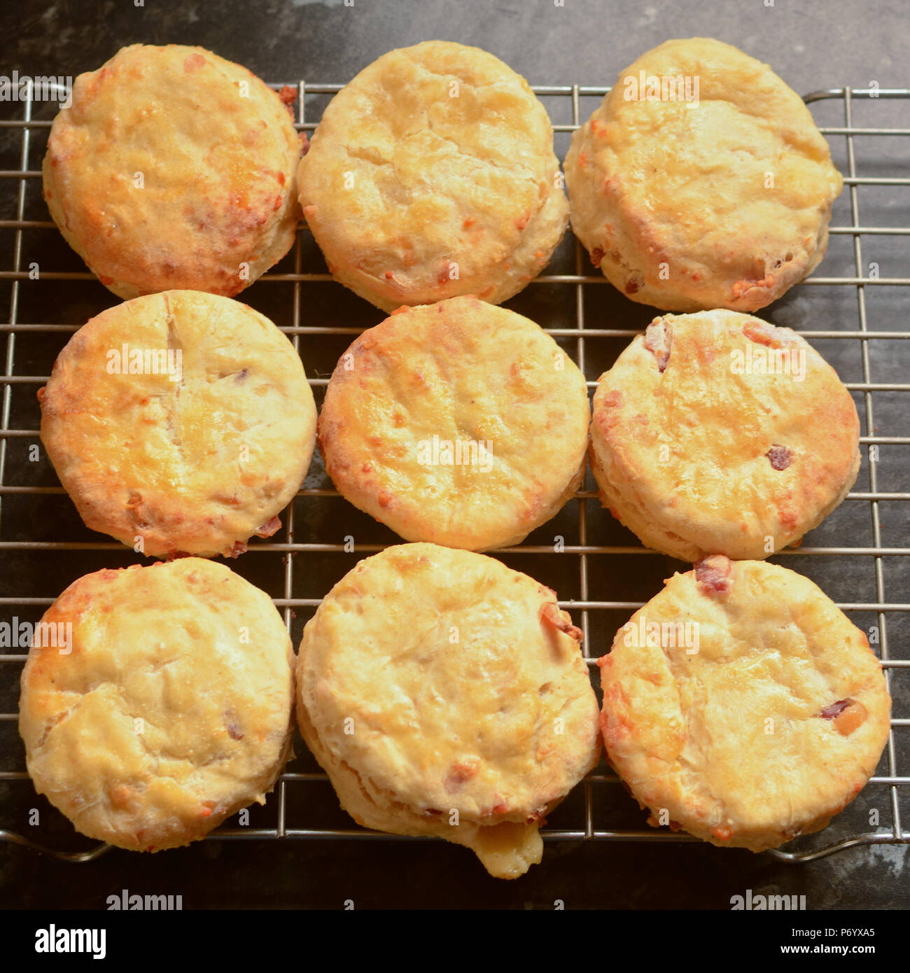 Cheese scones cooling on wire rack Stock Photo Alamy
