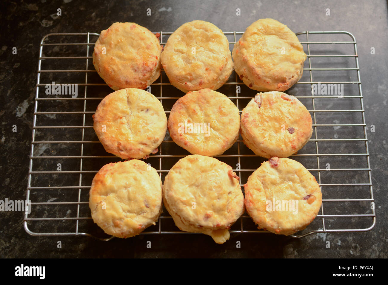 Cheese scones cooling on wire rack Stock Photo Alamy
