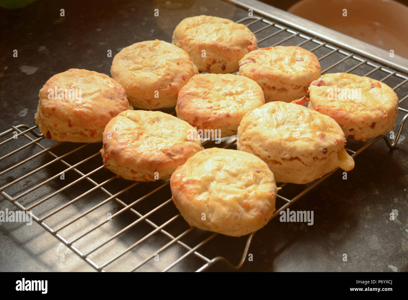 Cheese scones cooling on wire rack Stock Photo Alamy