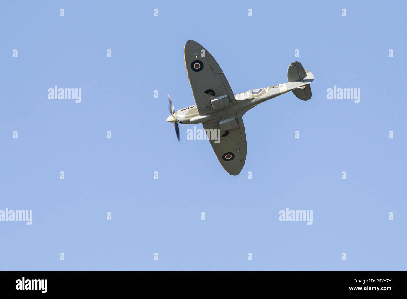 Supermarine Spitfire TR Mk IXc flying overhead at The Blades Summer  Ball 2018, Sywell aerodeome, Northamptonshire. Stock Photo