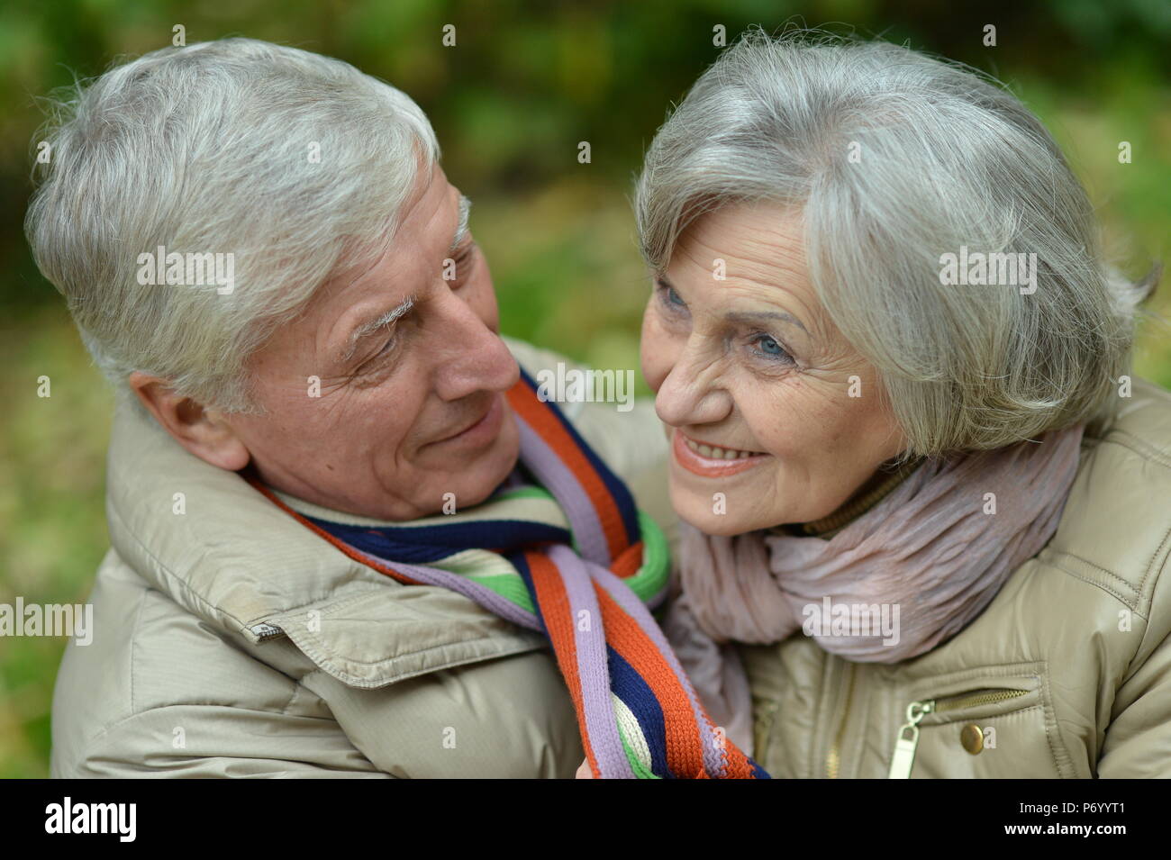 portrait of beautiful caucasian senior couple walking Stock Photo - Alamy