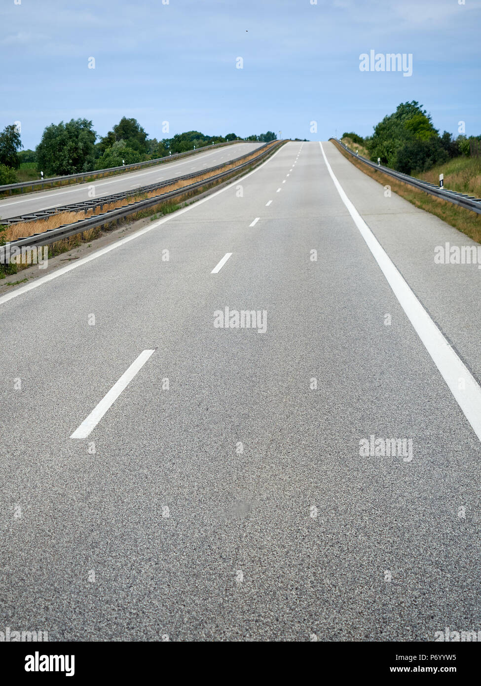 Rise empty freeway or highway Stock Photo - Alamy