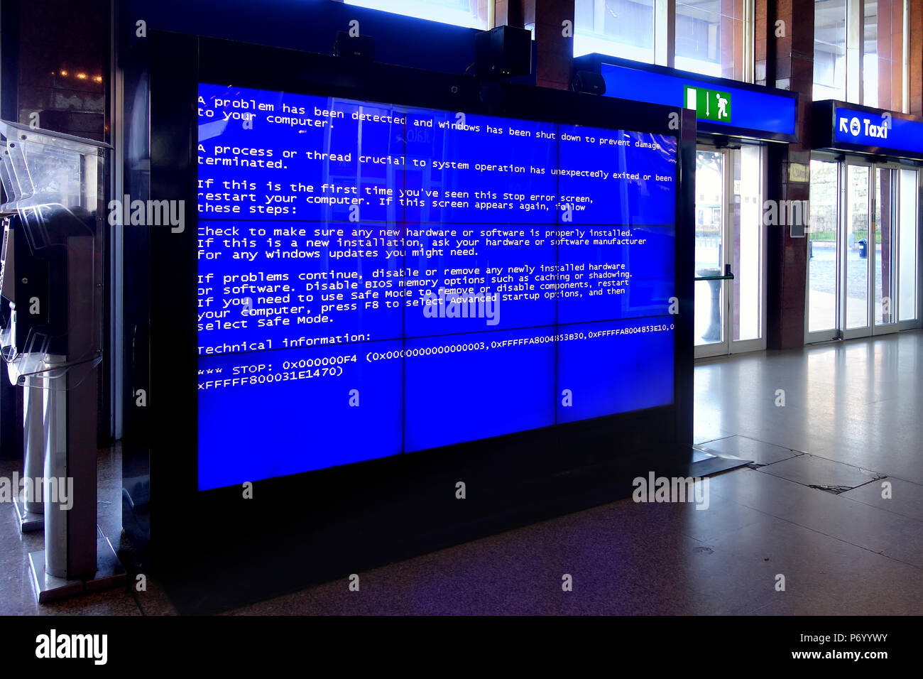 Rome, Italy - Jan 2015: The Blue Screen of Death in the video wall at termini railway station in Rome that is an error screen displayed after a fatal  Stock Photo