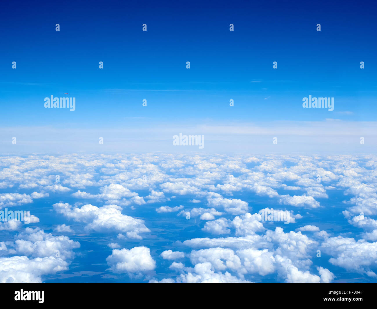 Carpet of white and fluffy clouds from above Stock Photo - Alamy