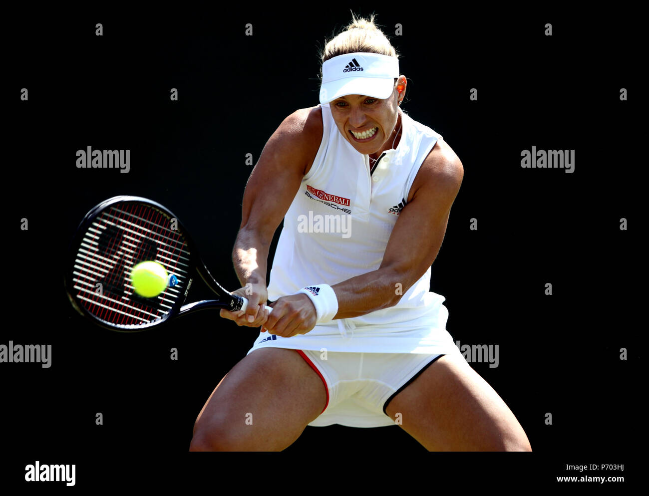 Angelique Kerber in action against Vera Zvonareva on day two of the Wimbledon Championships at the All England Lawn Tennis and Croquet Club, Wimbledon. Stock Photo