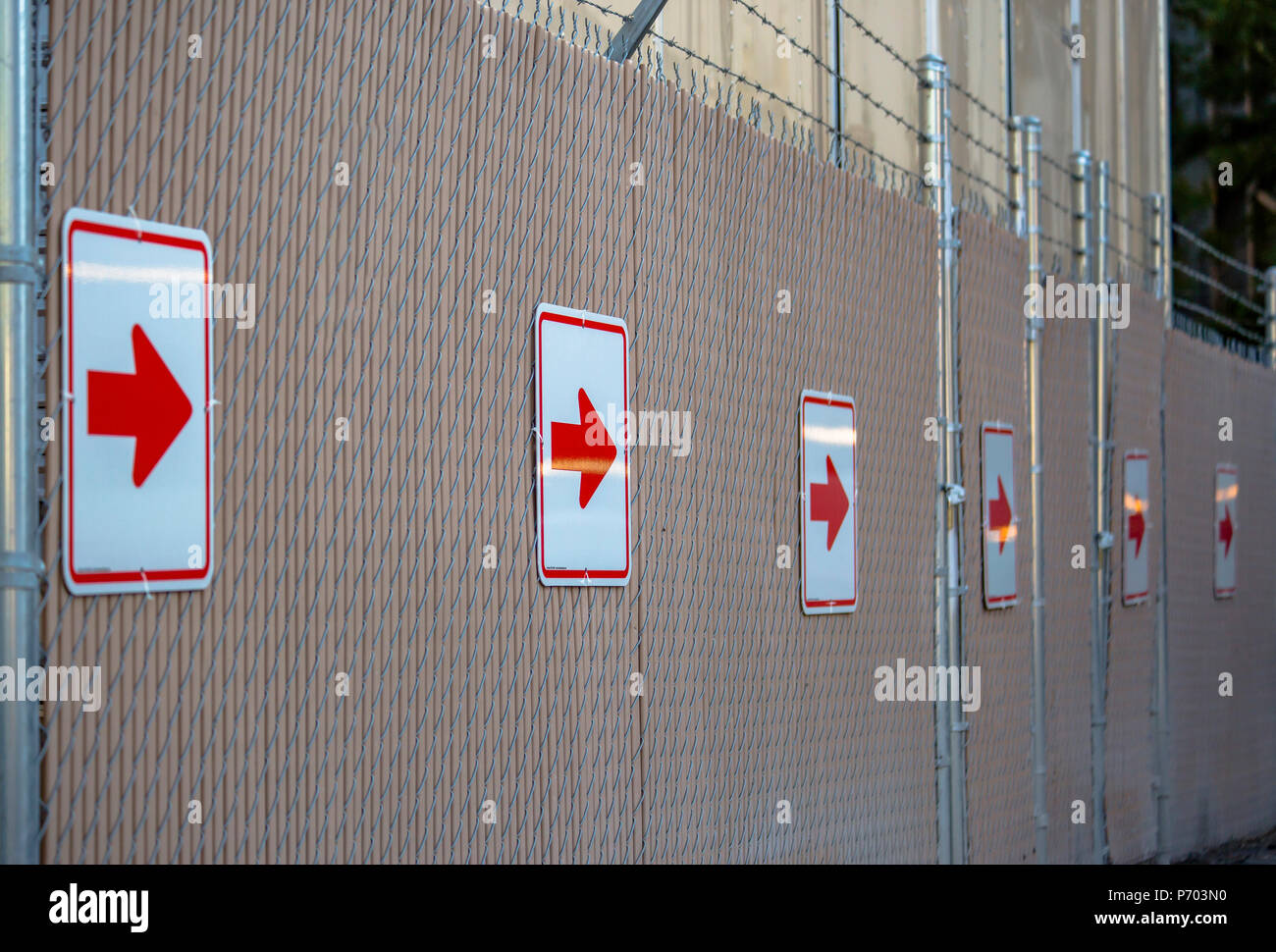 Red arrow signs poi Stock Photo - Alamy