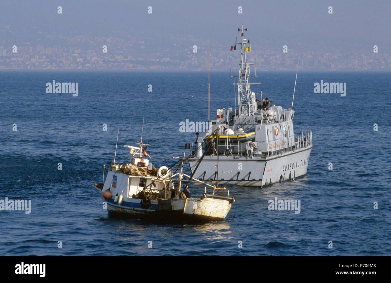 Italian finance police, 'Bigliani' class patrol boat controls a fishing vessel  in the Gulf of Naples Stock Photo