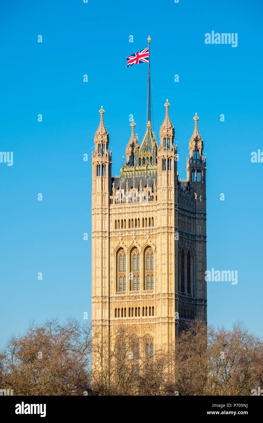 United Kingdom, England, London. Union Jack flag flown above Victoria Tower, Palace of Westminster, the houses of Parliament of the United Kingdom. Stock Photo