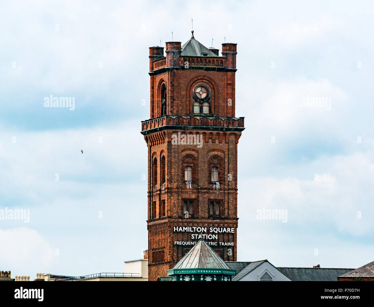 View of red brick Victorian tower of Hamilton Square Railway Station, Birkenhead, Merseyside, England, UK Stock Photo