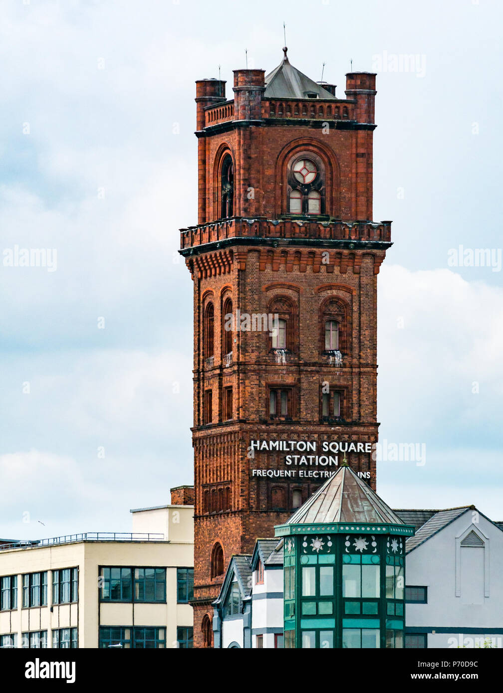 View of red brick Victorian tower of Hamilton Square Railway Station, Birkenhead, Merseyside, England, UK Stock Photo