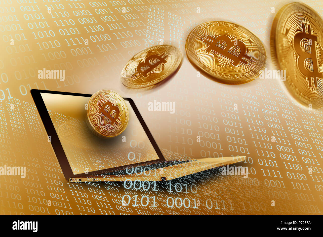 Golden Bitcoins over laptop Stock Photo