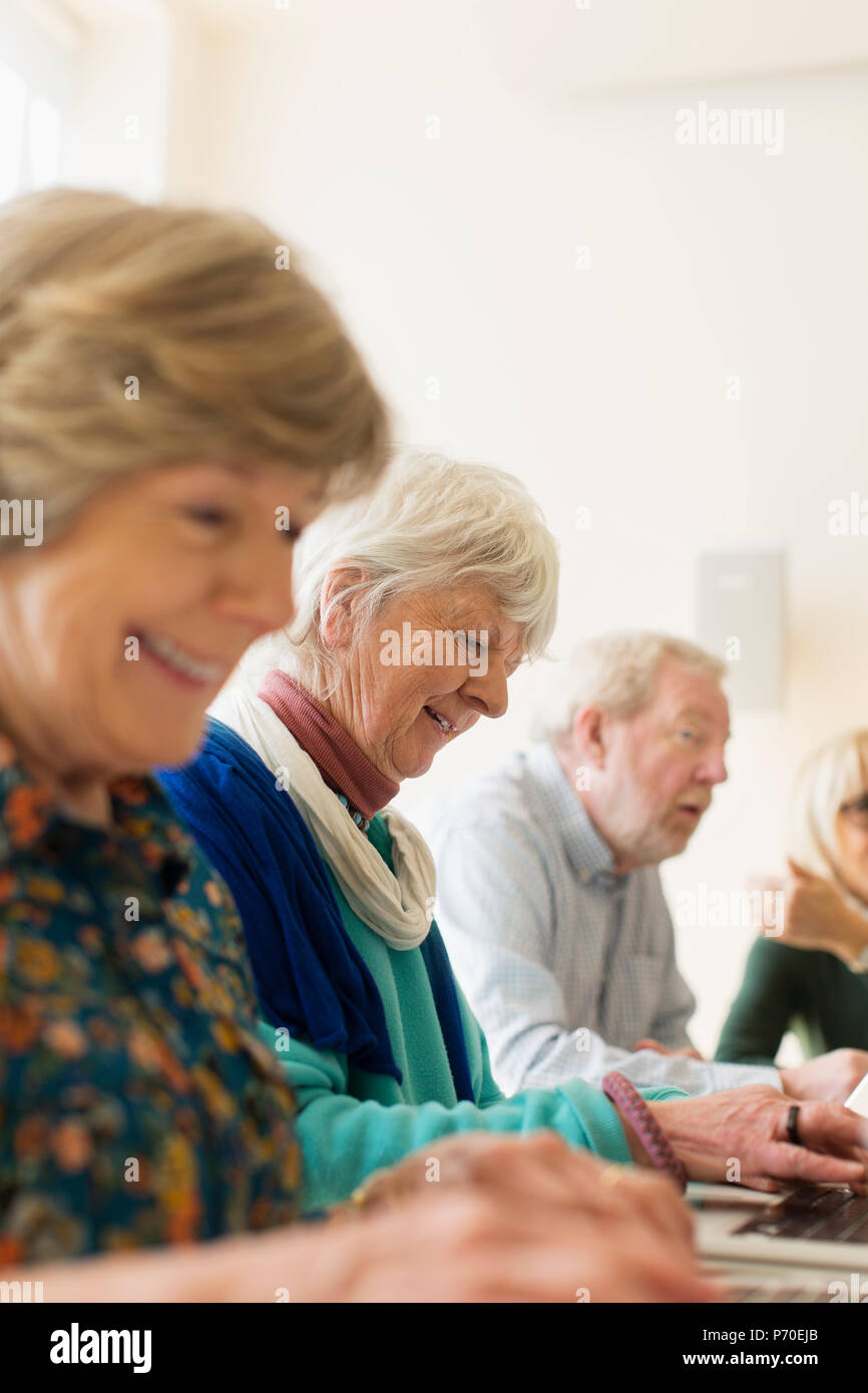Smiling senior business people in conference room meeting Stock Photo