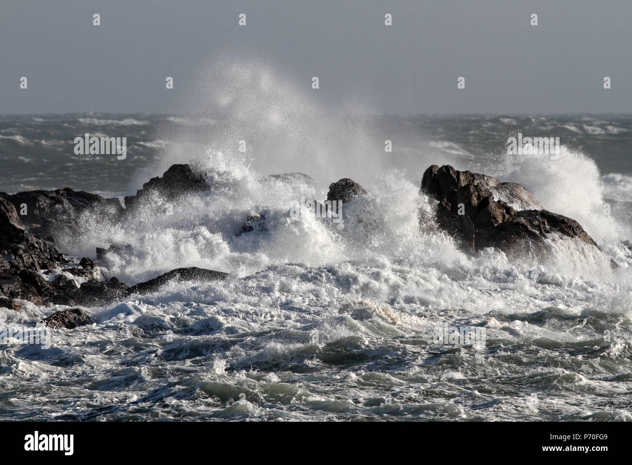 Big waves crash against rocky hi-res stock photography and images - Alamy