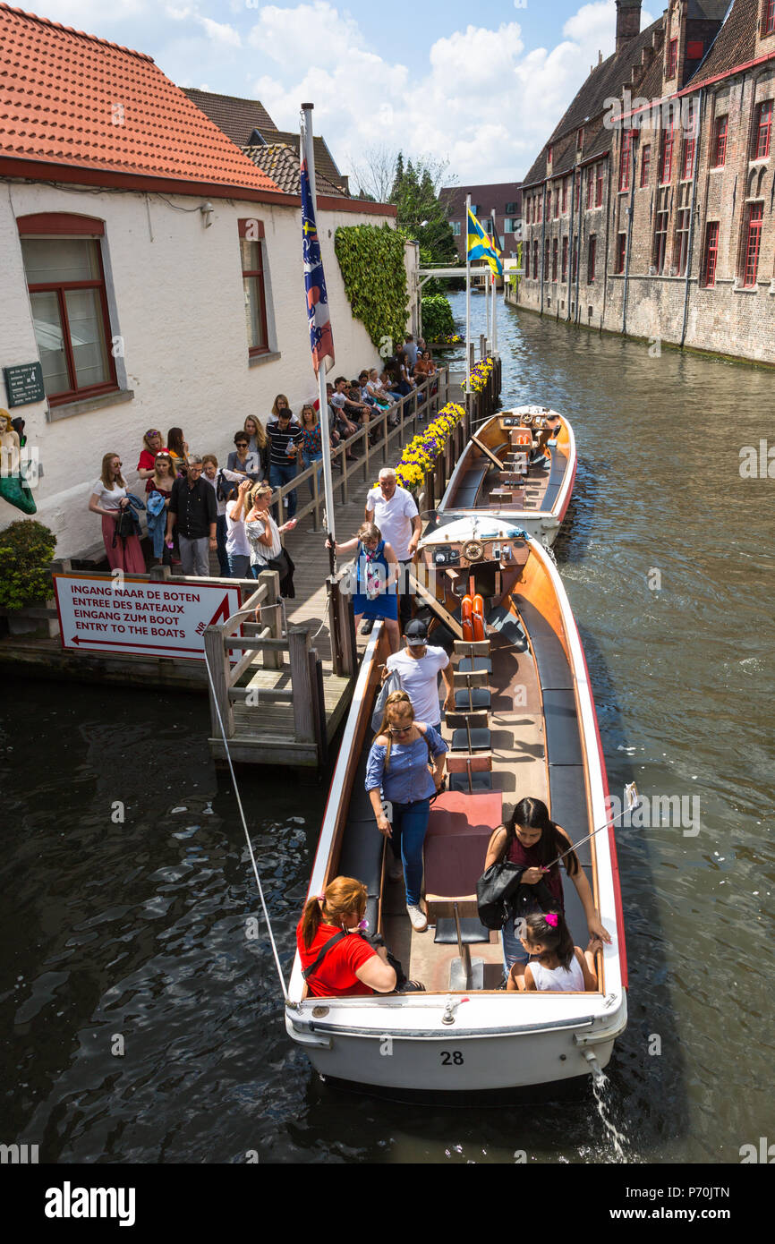 tourist boat trip on the canal, Bruges, Belgium Stock Photo