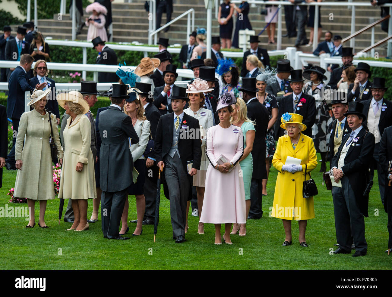 HM The Queen views the racing from the paddock enclosure with other members of the Royal family on the first day of Royal Ascot. Stock Photo