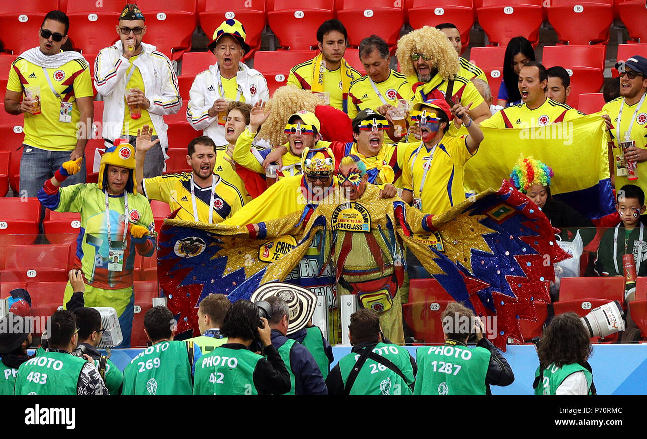 Colombia fans pose for photographs in the stands during the FIFA World Cup 2018, round of 16 match at the Spartak Stadium, Moscow. Stock Photo