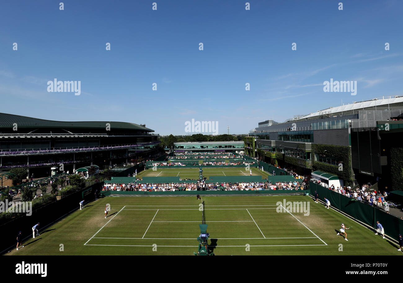 General action on courts 14,15,16 and 17 on day two of the Wimbledon Championships at the All England Lawn Tennis and Croquet Club, Wimbledon. Stock Photo