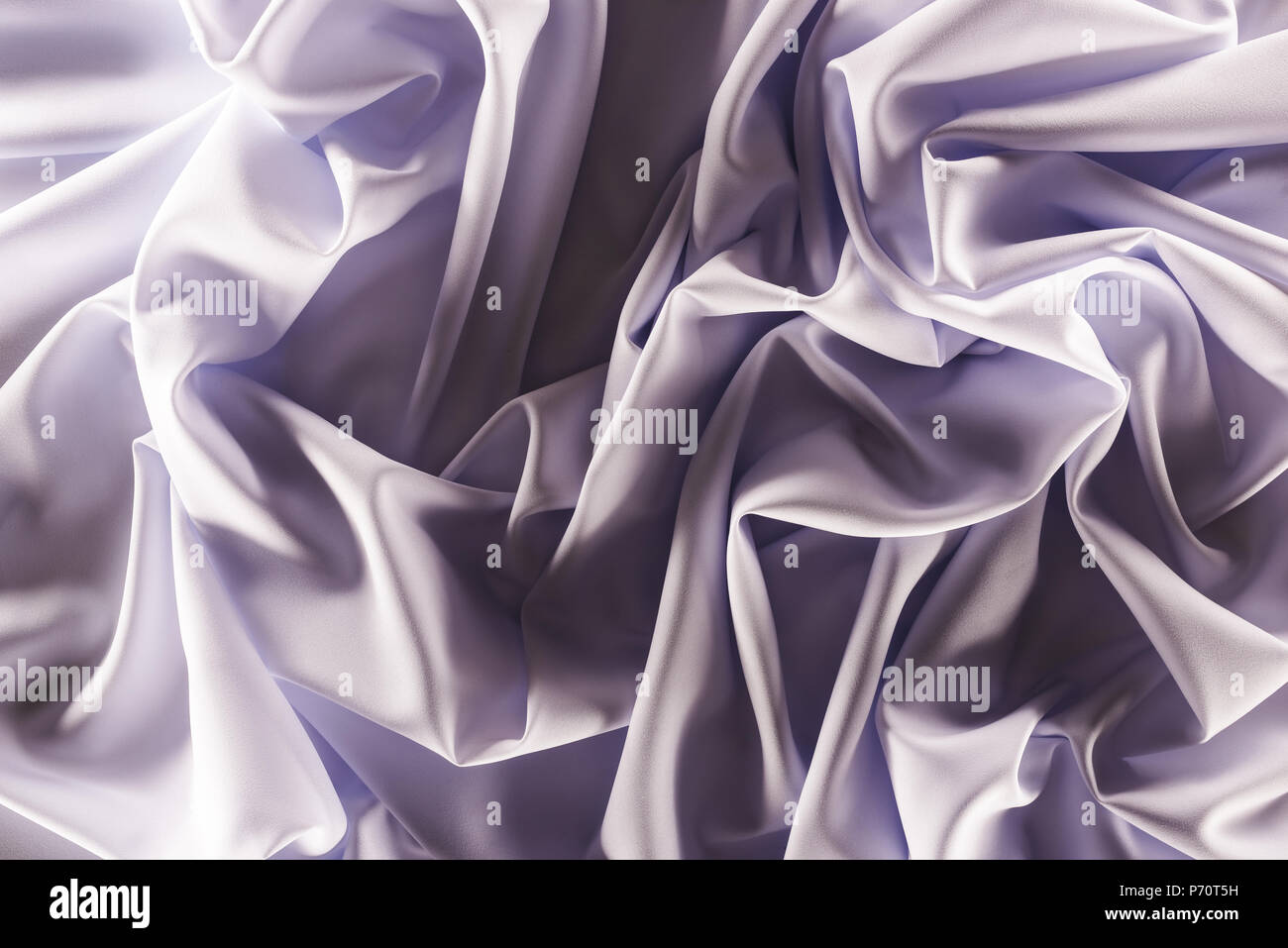 full frame of folded elegant purple silk fabric as background Stock ...