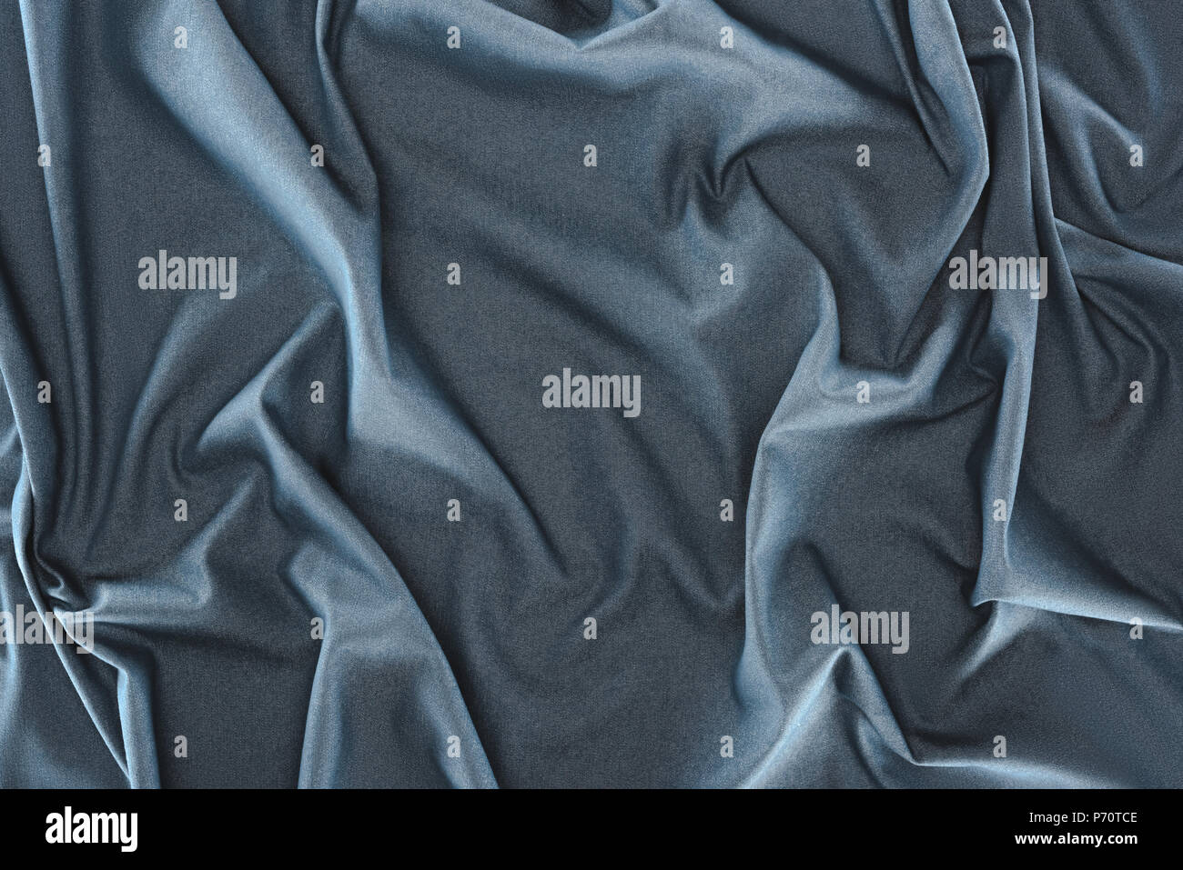 close up view of crumpled dark blue silk fabric as background Stock ...