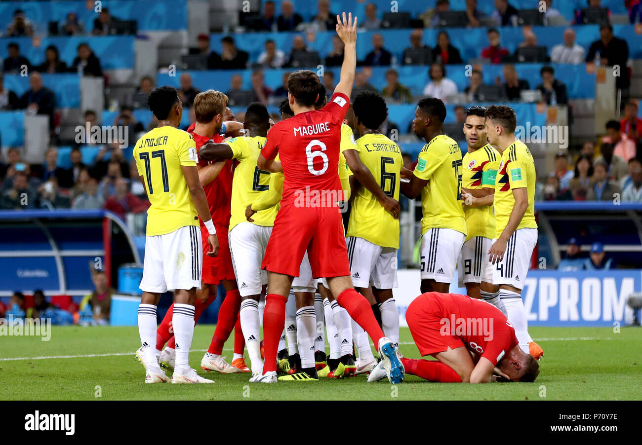 Tempers flare whilst England's Jordan Henderson (bottom right) crouches on the floor after being head butted by Colombia's Wilmar Barrios during the FIFA World Cup 2018, round of 16 match at the Spartak Stadium, Moscow. Stock Photo