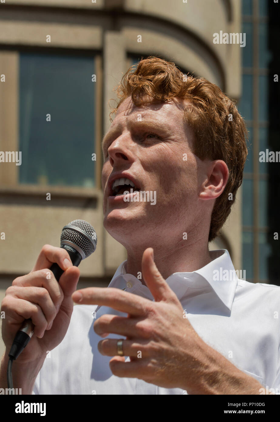 U.S. Democratic Representative Joseph Patrick Kennedy III (Joe Kennedy), grandson of Robert Kennedy and grand-nephew of John F. Kennedy Speaking during the Rally against Family Separation in Boston, MA. Kennedy had spoken against U.S. President Donald Trump’s policy of detaining immigrants and separating immigrant families.  Large rallies against U.S. President Trump’s policy of separating immigrant families took place in more than 750 U.S. cities on June 30th of 2018. Stock Photo
