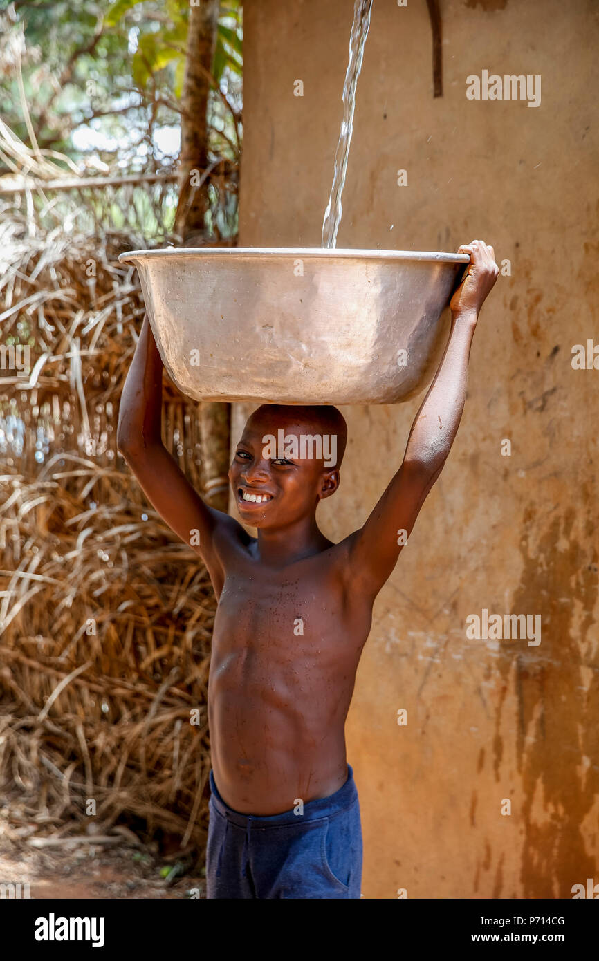 Collecting water in a Zou province village, Benin, West Africa, Africa Stock Photo