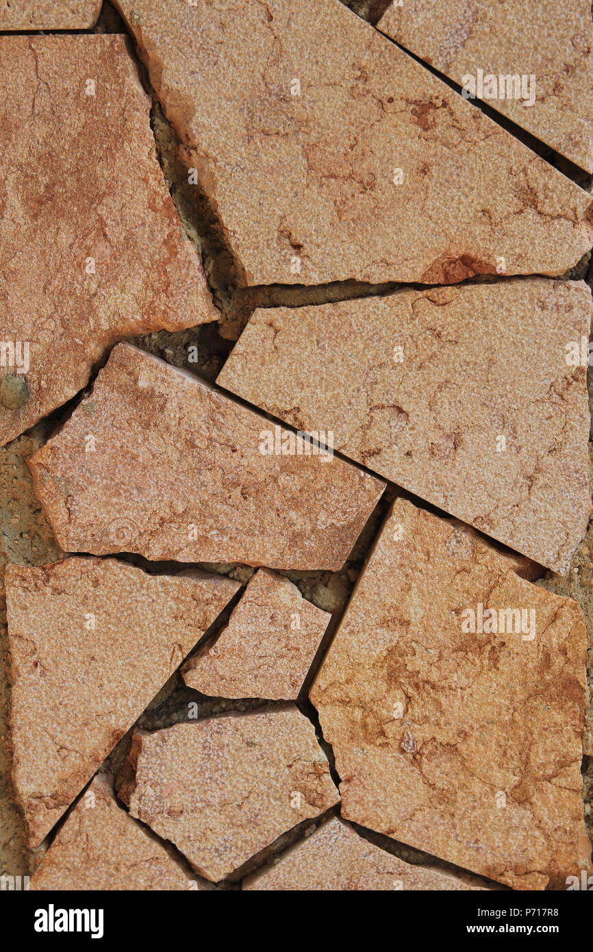 The texture of the masonry walls of light-colored stone Stock Photo