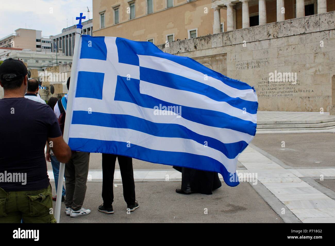 flying the greek flag outside the parliament athens greece Stock Photo