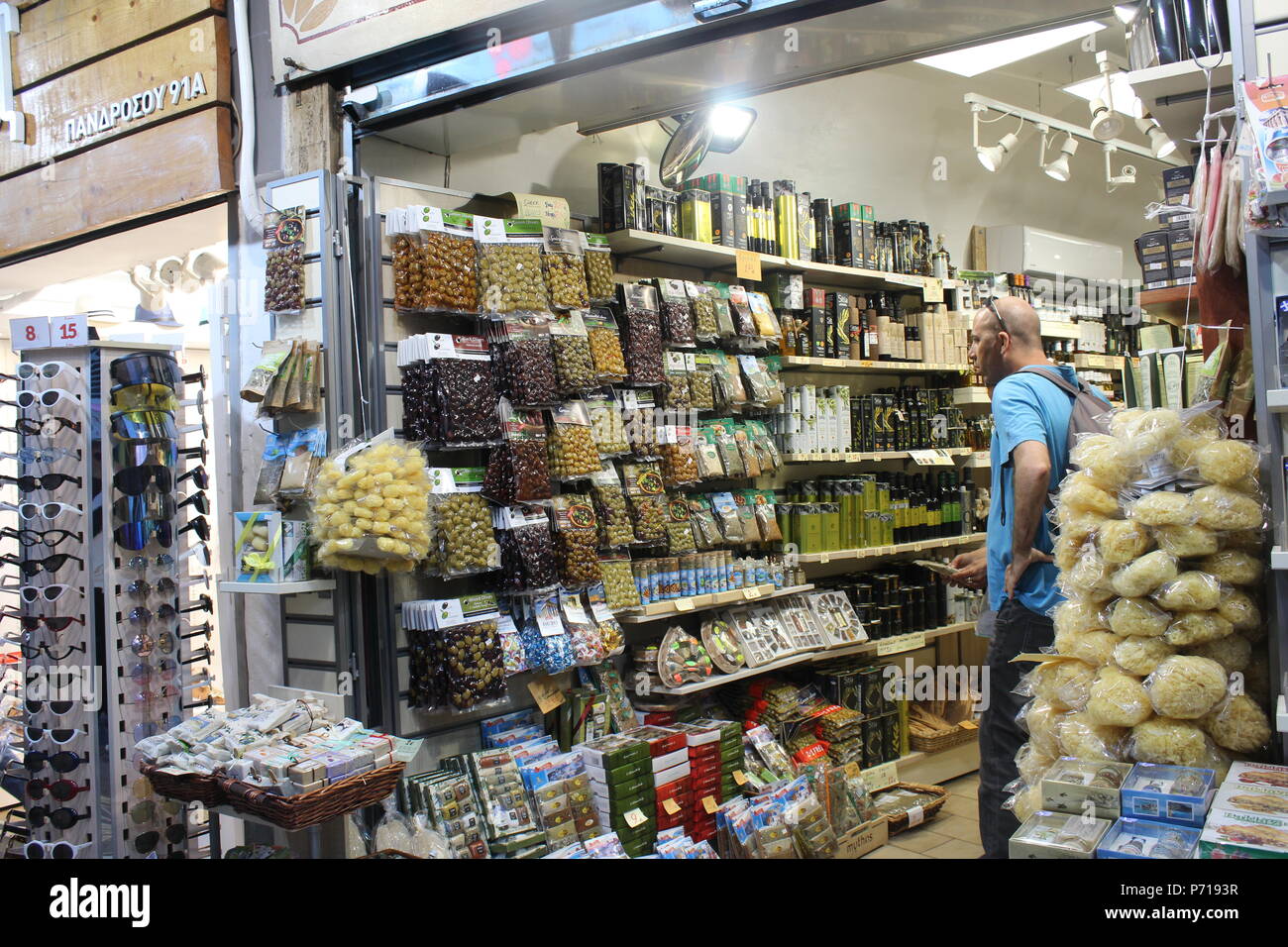 shop in market selling olives and stuff athens greece Stock Photo Alamy