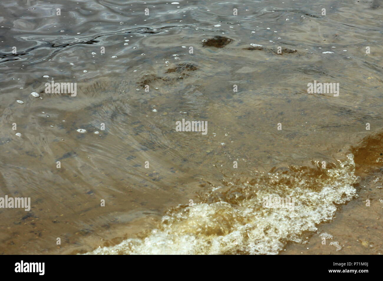 Sea blue water waves background Stock Photo - Alamy