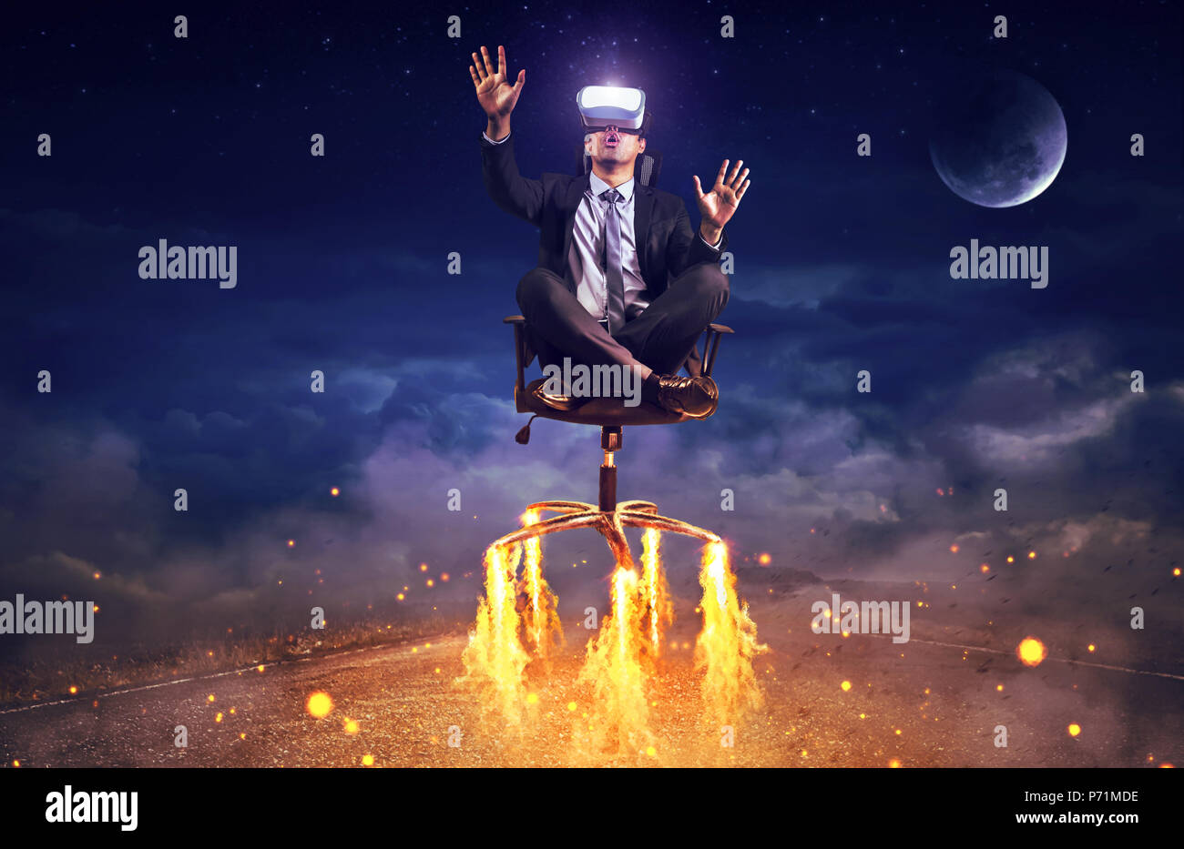 Businessman sitting in chair  wearing virtual reality glasses. Mixed media Stock Photo