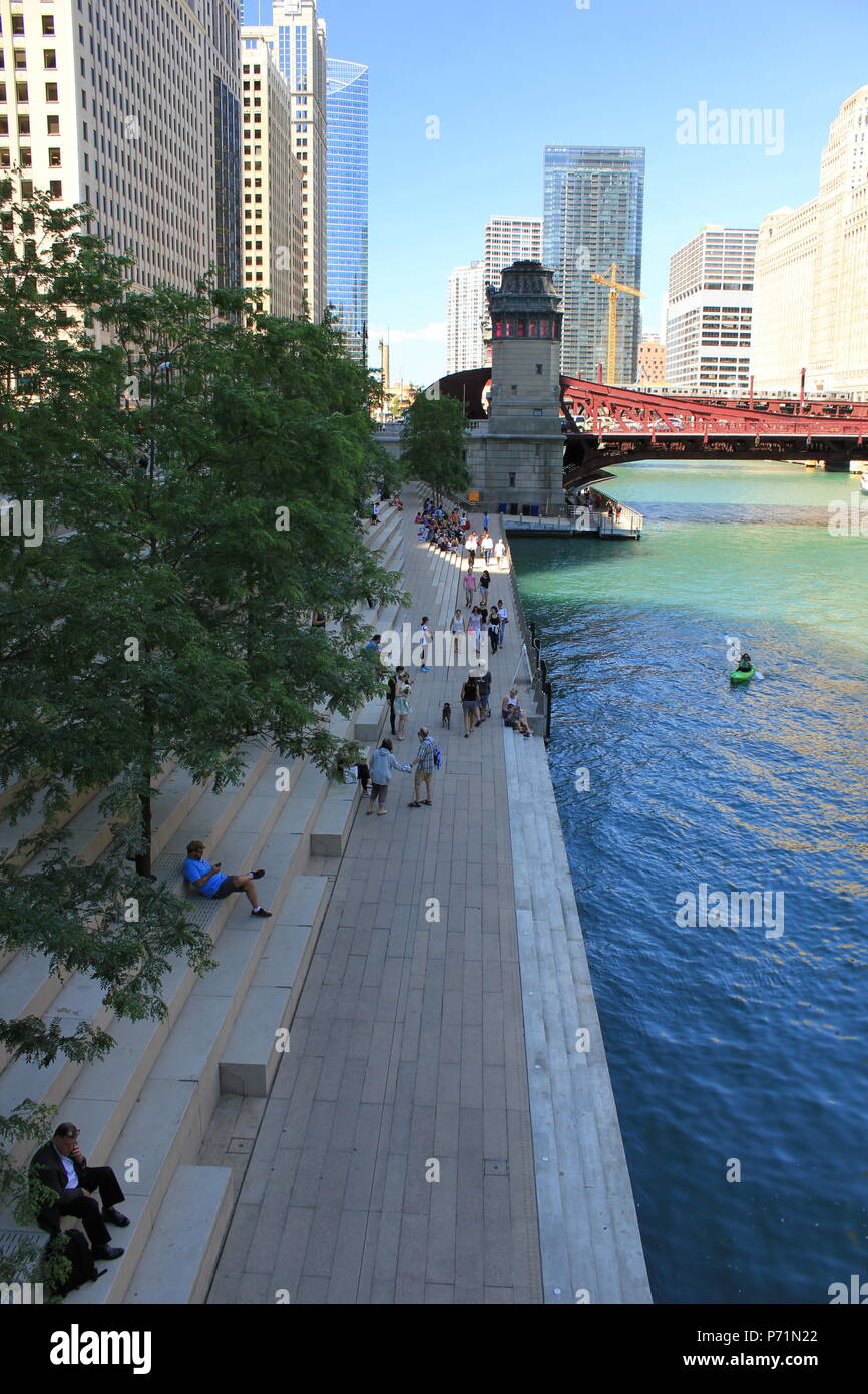 View of Chicago's scenic and modern downtown river walk along the Chicago River ...