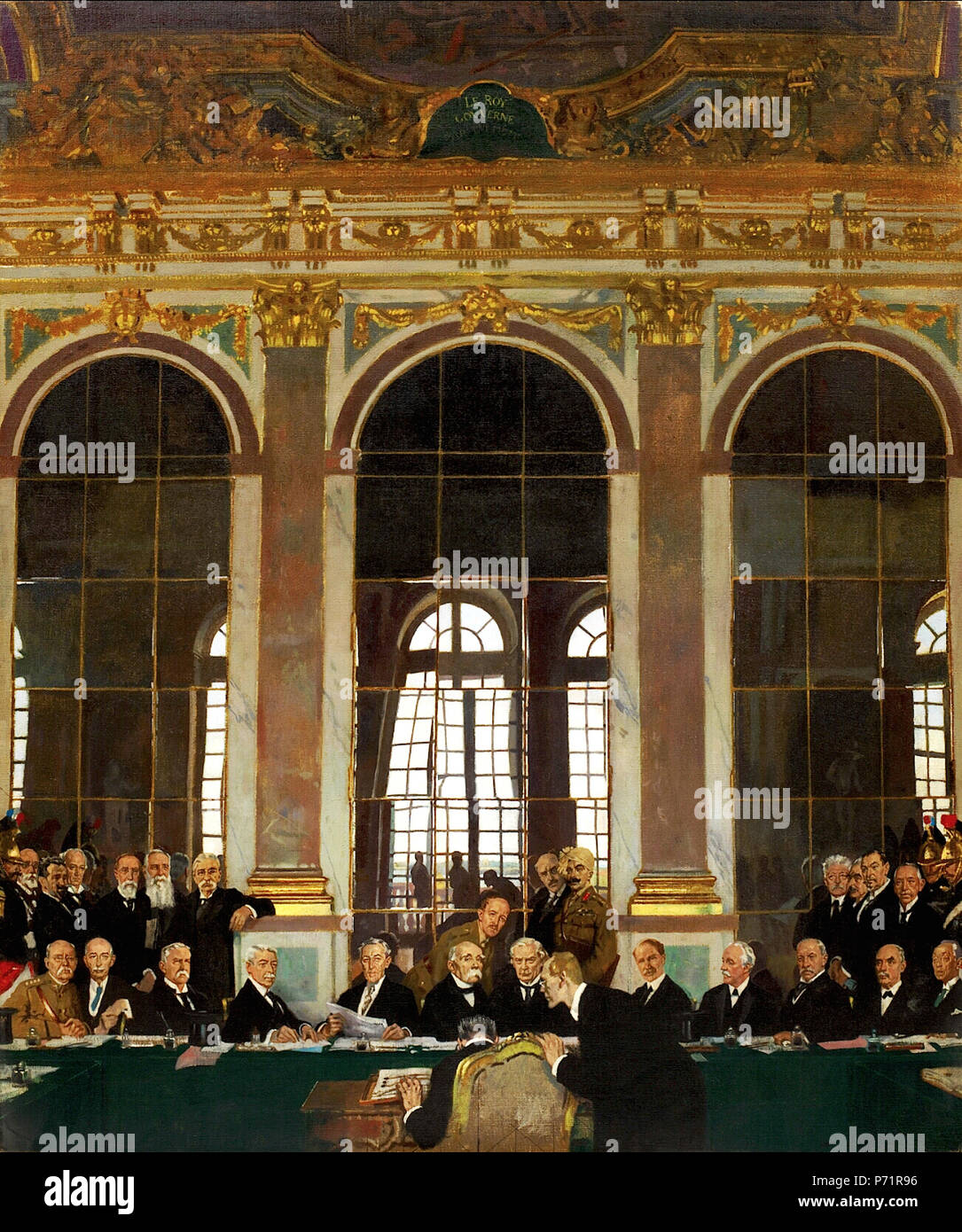 . The Signing of Peace in the Hall of Mirrors, Versailles, 28th June 1919 .  A view of the interior of the Hall of Mirrors at Versailles, with the heads of state sitting and standing before a long table. Front Row: Dr Johannes Bell (Germany) signing with Herr Hermann Muller leaning over him. Middle row (seated, left to right): General Tasker H Bliss, Col E M House, Mr Henry White, Mr Robert Lansing, President Woodrow Wilson (United States); M Georges Clemenceau (France); Mr D Lloyd George, Mr A Bonar Law, Mr Arthur J Balfour, Viscount Milner, Mr G N Barnes (Great Britain); The Marquis Saionzi  Stock Photo