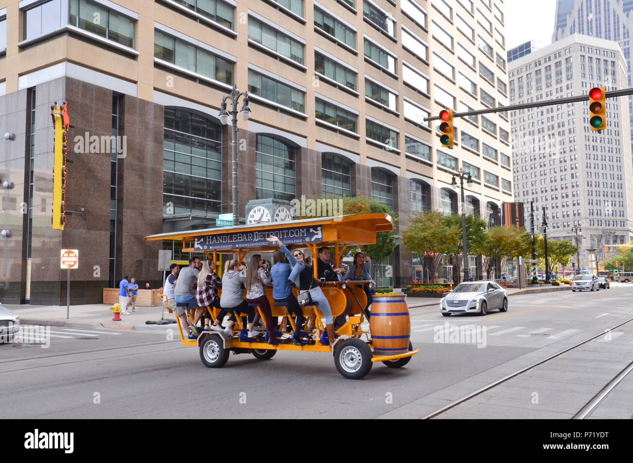 DETROIT, MI / USA - OCTOBER 21, 2017:  Visitors take a ride on the Handle Bar as it crosses Woodward Avenue in downtown Detroit. Stock Photo