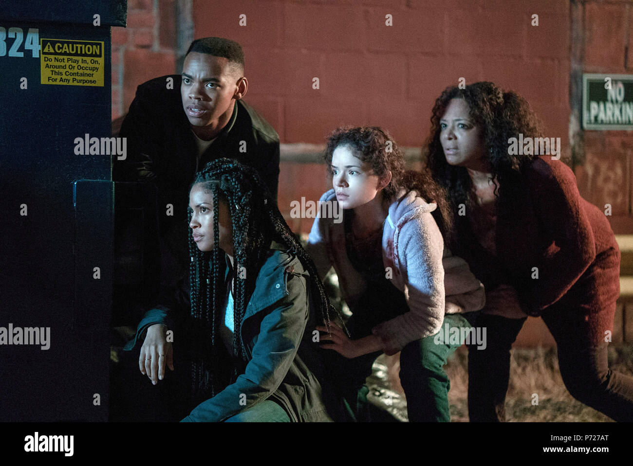 THE FIRST PURGE, front, from left: Joivan Wade, Lex Scott Davis