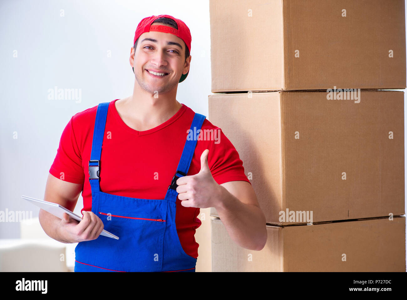 Contractor worker moving boxes during office move Stock Photo
