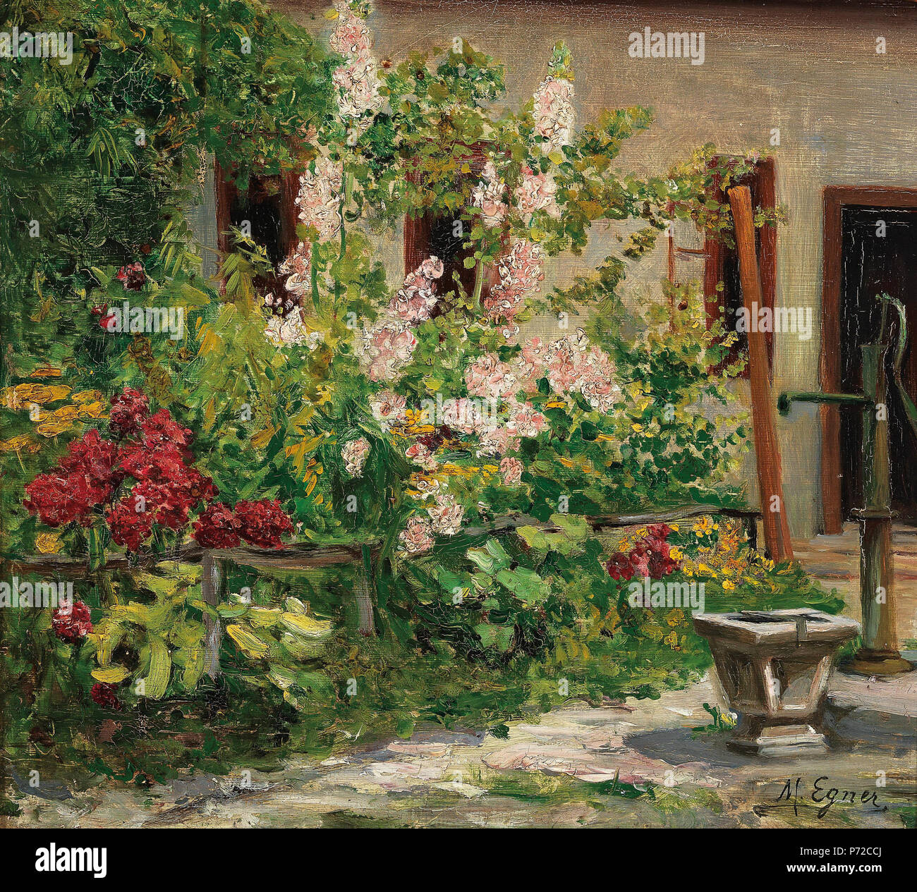 40 Marie Egner mit blühenden Stockrosen Stock Photo Alamy