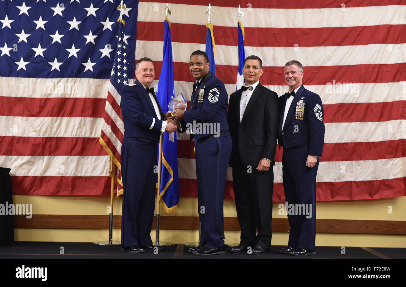 Air Commandos and families attend a banquet to recognize the Air Force Special Operations Command’s 2016 Outstanding Airmen of the Year at Hurlburt Field, Fla., May 10, 2017. AFSOC formally recognized its outstanding Airmen of the year with a week-long tour of Hurlburt Field. Stock Photo